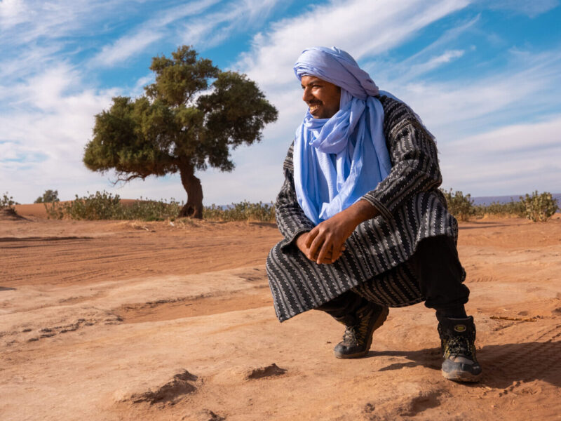 Camp owner in traditional desert clothing